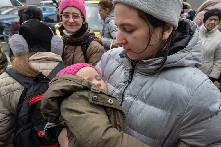 ukrainian mother with her child sleeping
