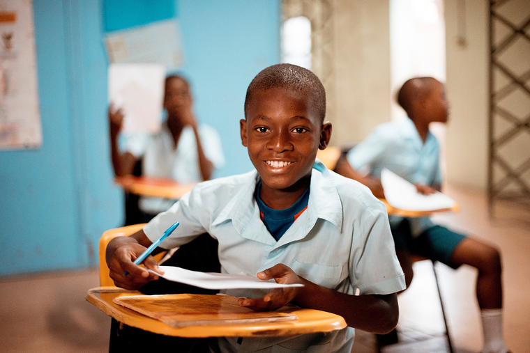 african american child sitting at desk