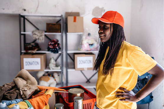 african american woman volunteering with donations