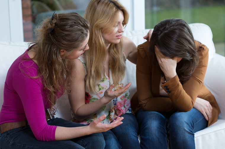 three women providing support for womens reproductive health